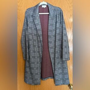 Long plaid blazer with pockets, size medium.